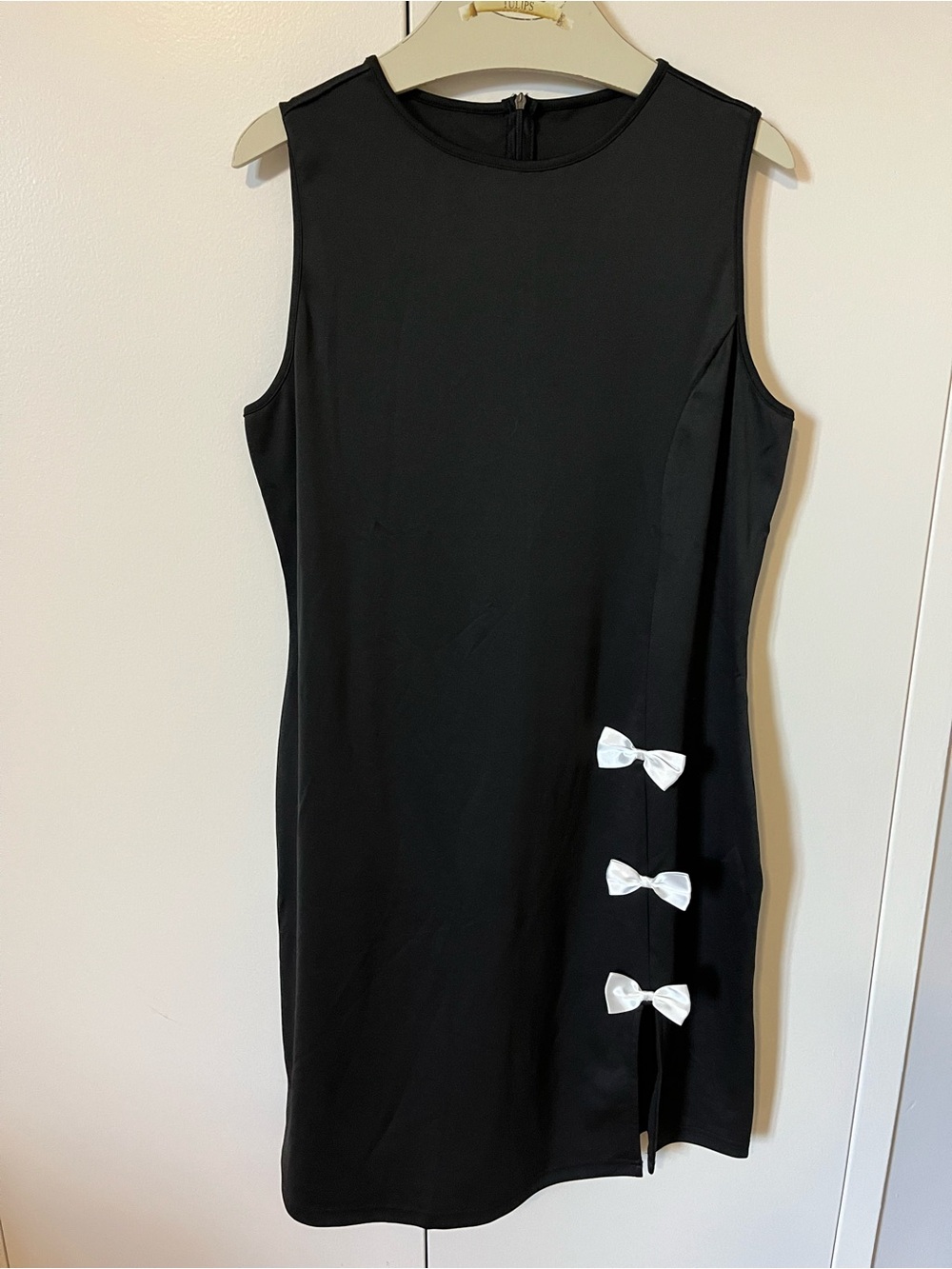 Women’s Black Sleeveless Dress with White Bow Accents